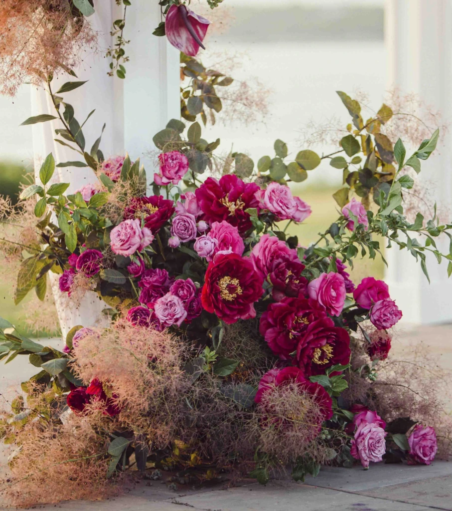 Ground arrangement of pink peonies and roses