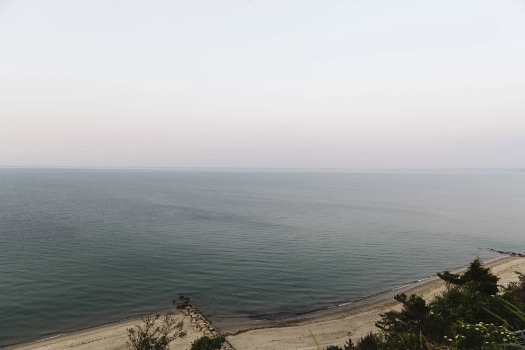 Calm ocean view from a bluff at dusk